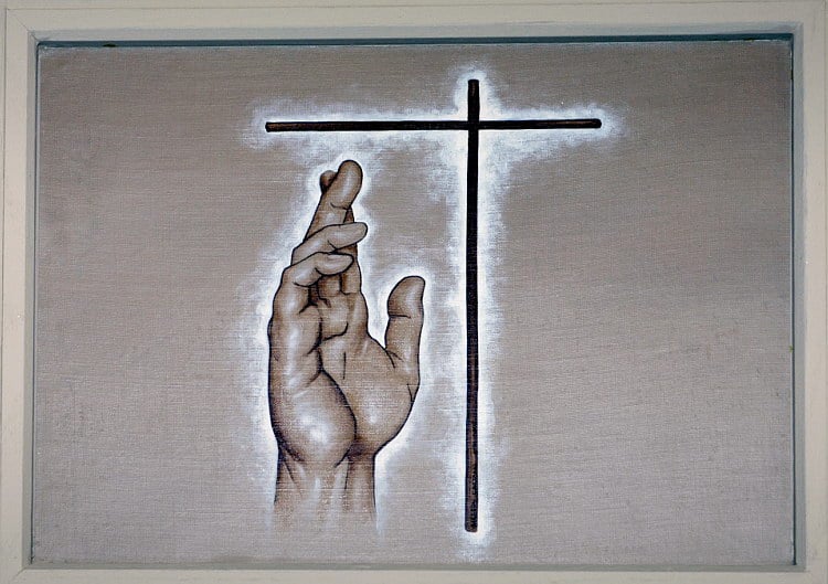 Holy Cross and forgiving hand gesture